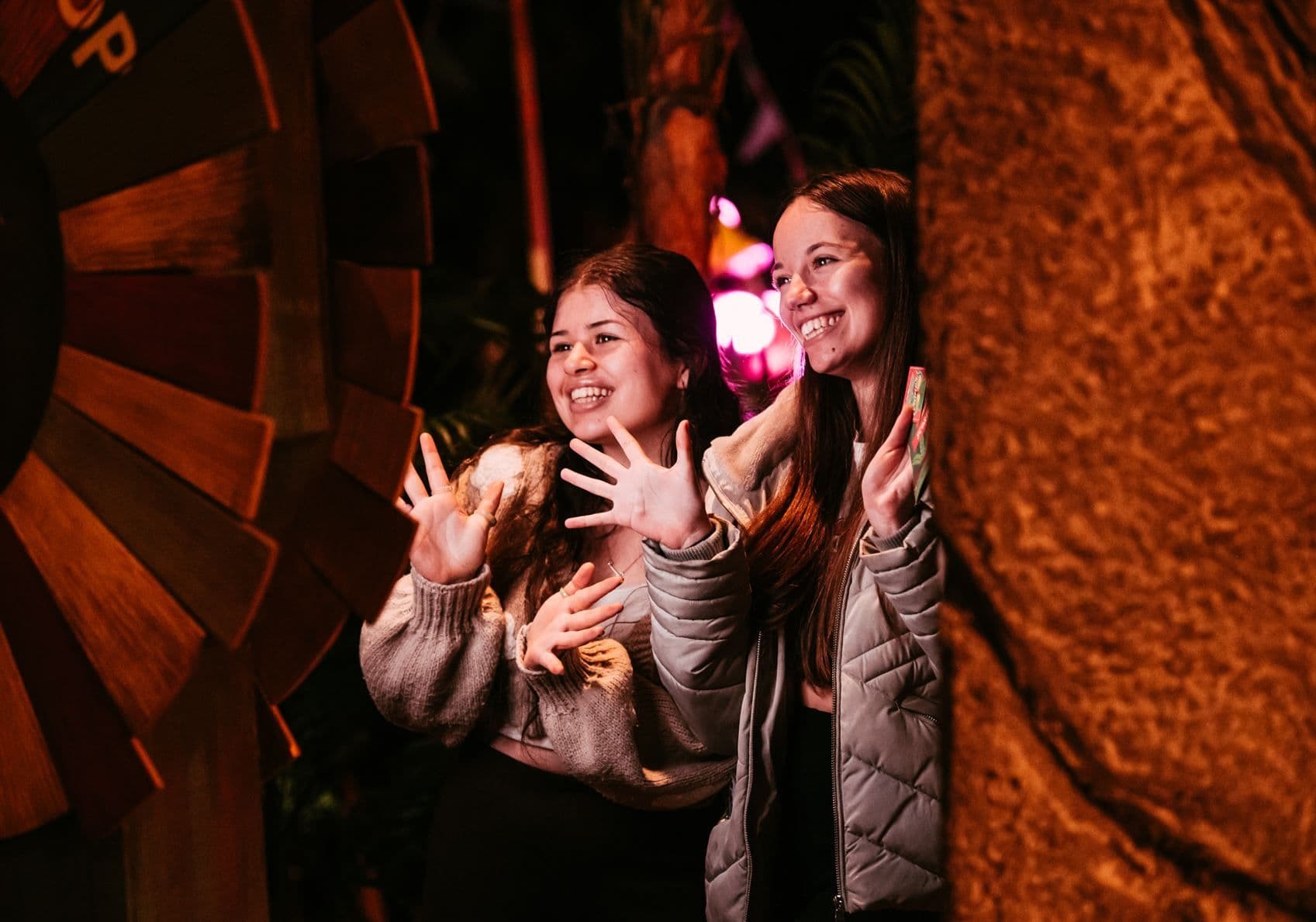 Two girls posing for the photobooth